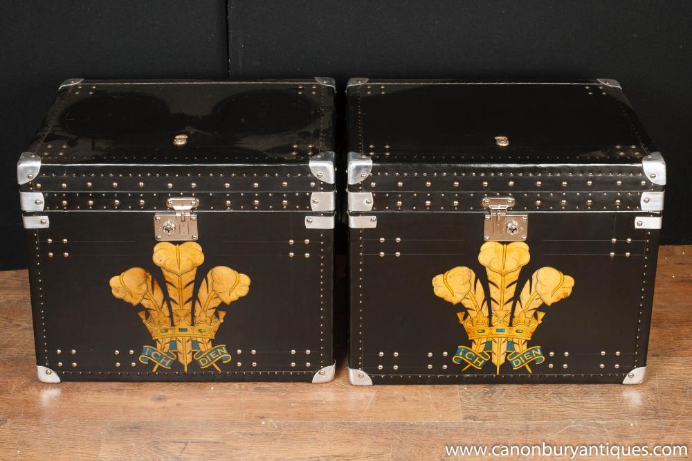 Pair steamer trunk side tables decorated with a Prince of Wales festoon