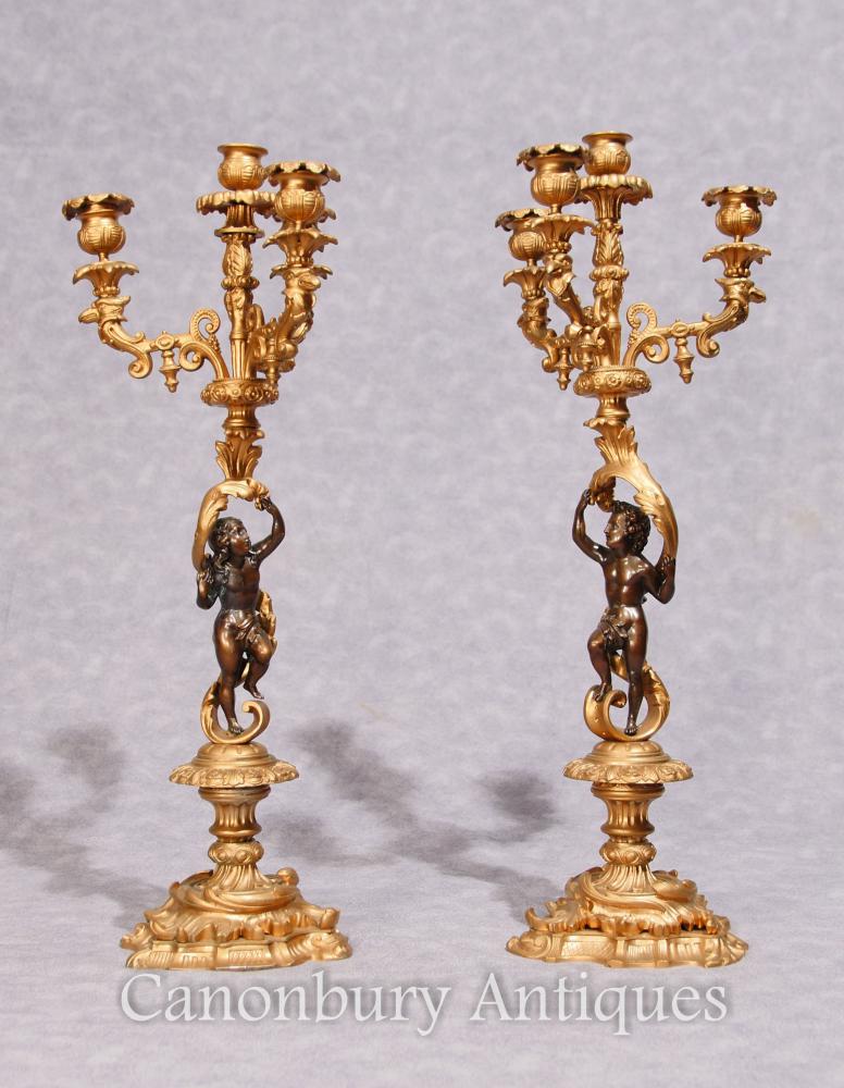 Photo: Classic French antique gilt candelabras with cherubs
