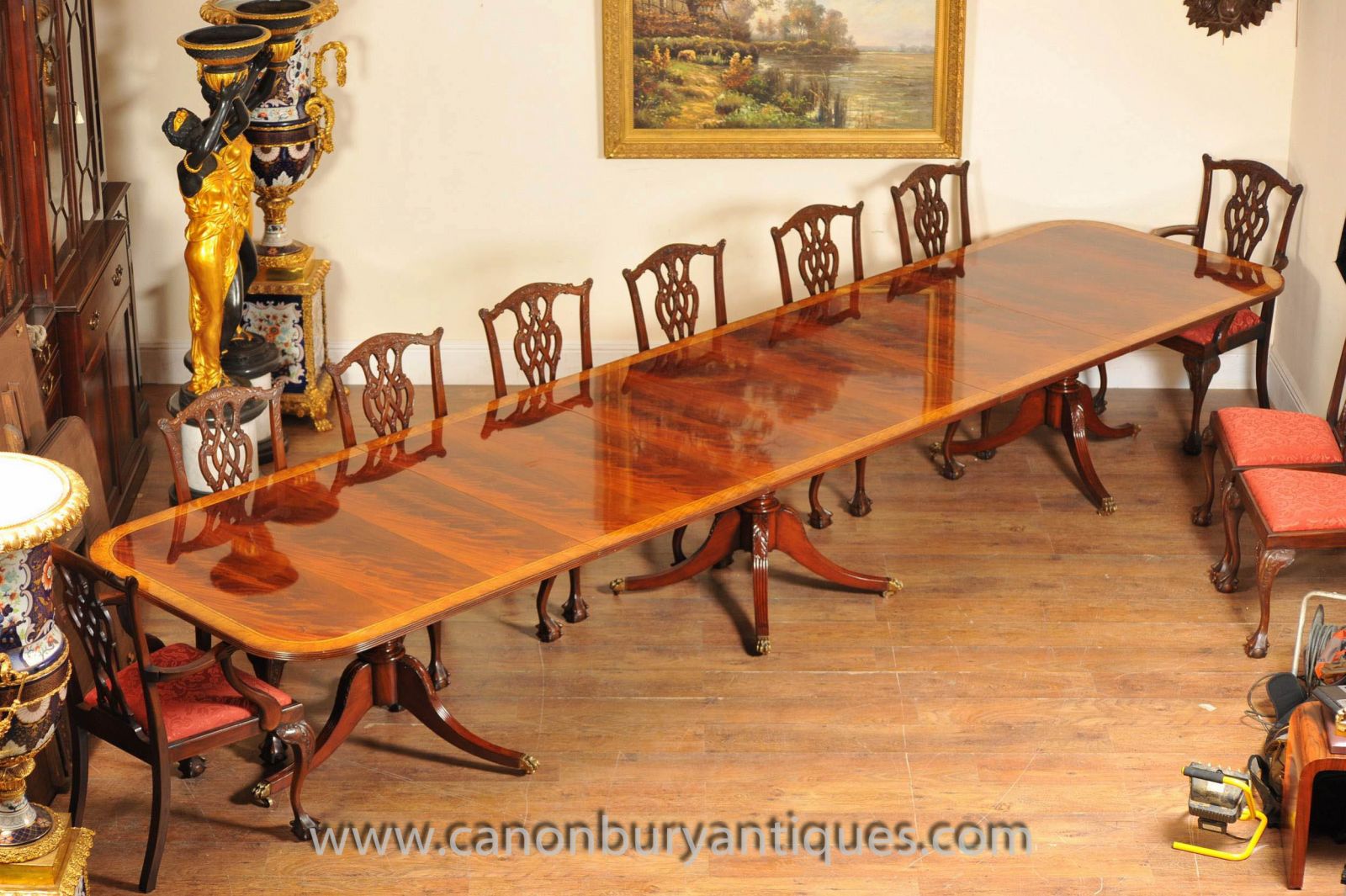 Regency table with set of Chippendale dining chairs to match